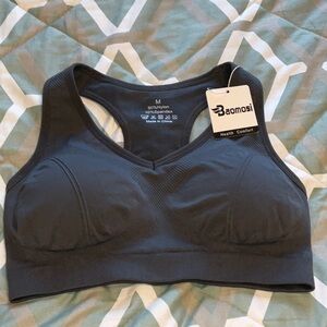 Baomosi Sport bra. Size medium more like a small. Pads come out. Gray in color.